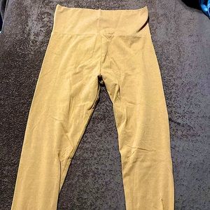 Tan leggings, darker in person